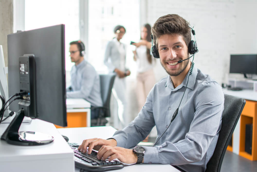 Operator With Headset Working in Call Center