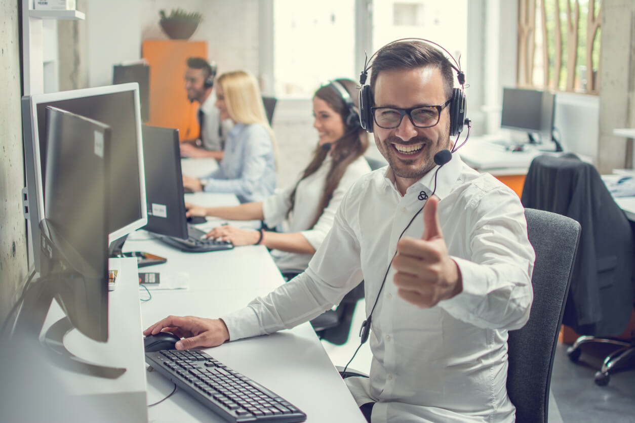 Operator With Headset Working in Call Center