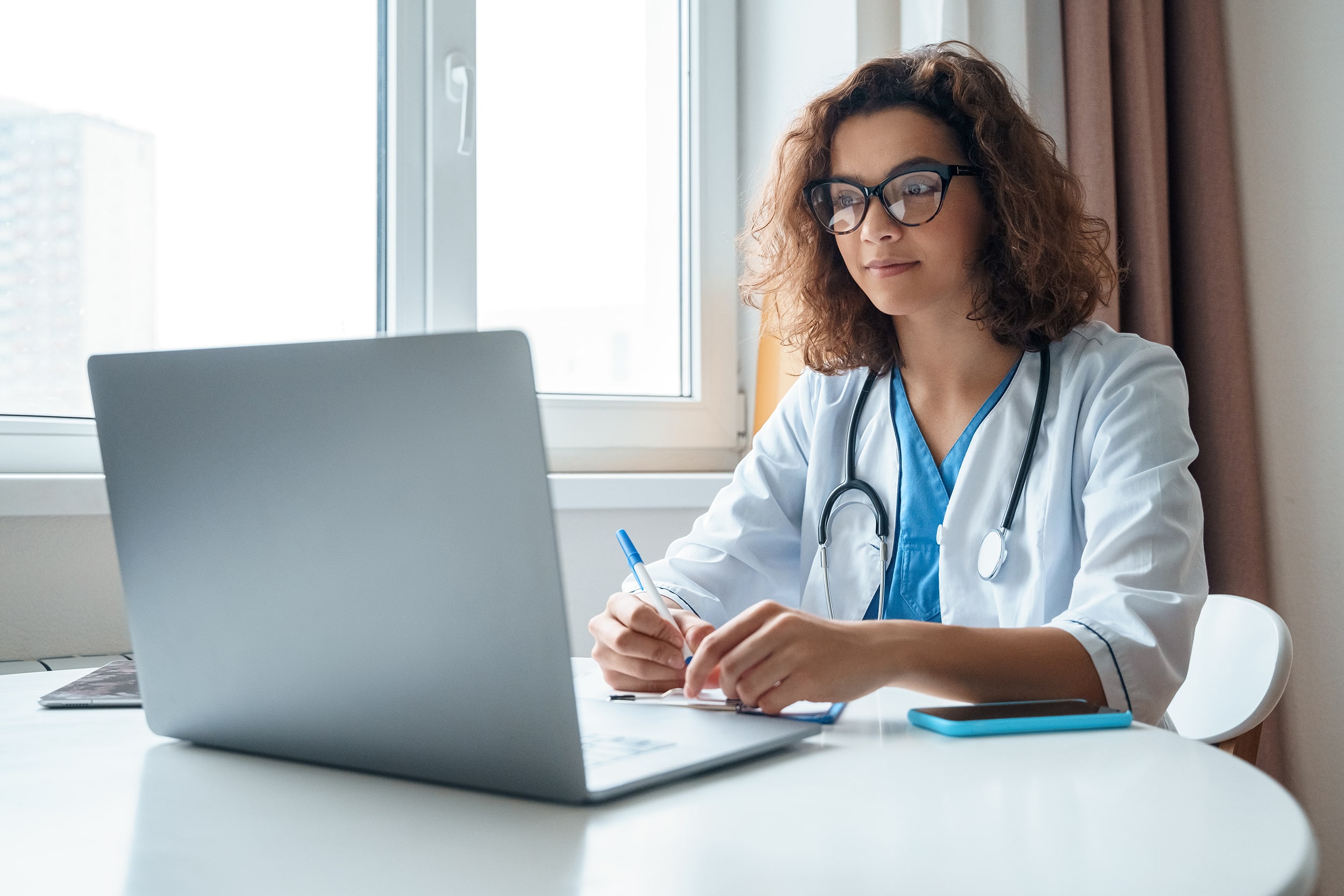 Doctor Working on a Laptop